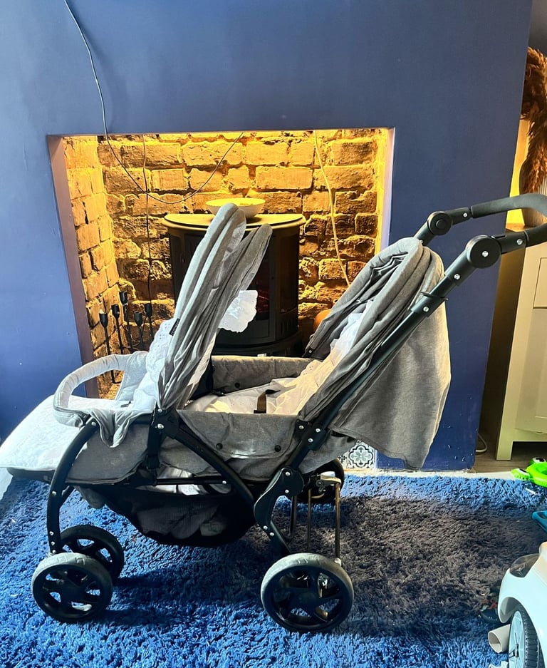 Gray twin pram for 25  and 2 PS4 games both 10 and brand new and dog or child sofa 55 