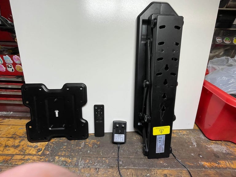 Tv remote wall or ceiling bracket 