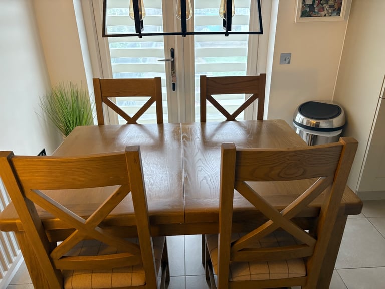 image for Extendable dining table + 4 chairs