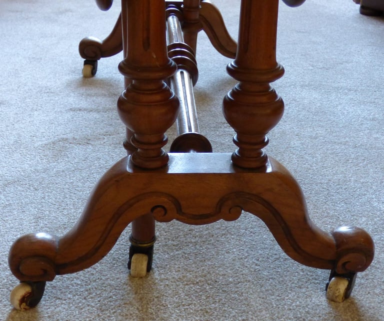 Original old Sutherland table. Original casters on feet.