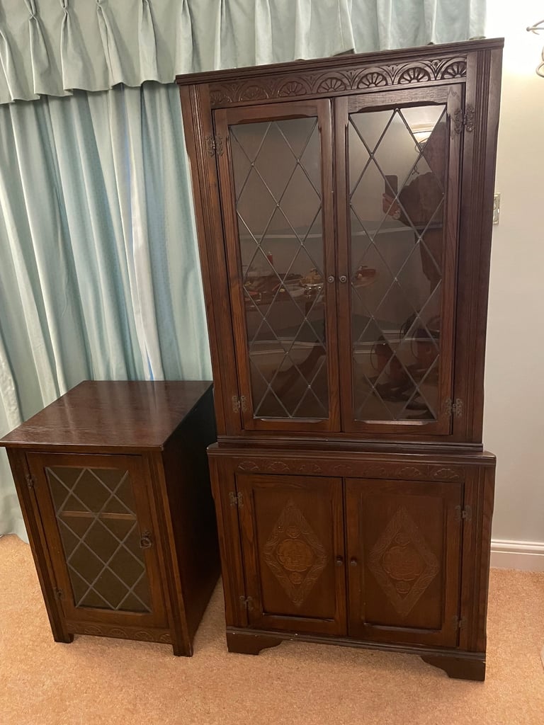 Lead windowed corner cabinet and music system cabinet 