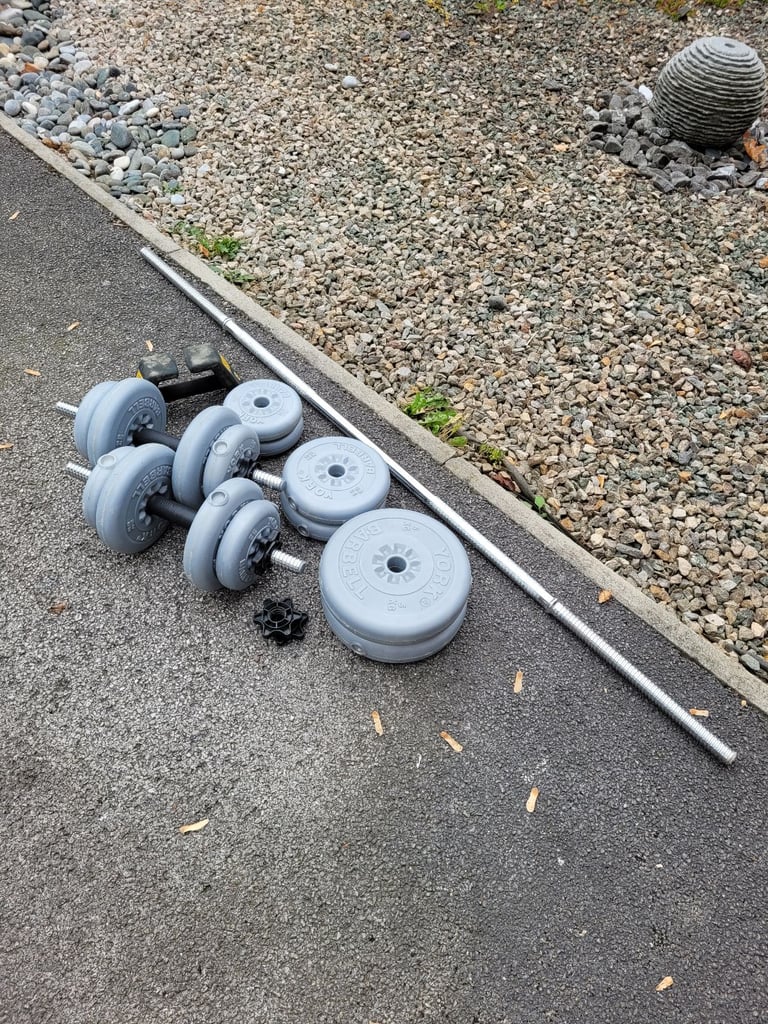 Set of weights including dumbells and barbell