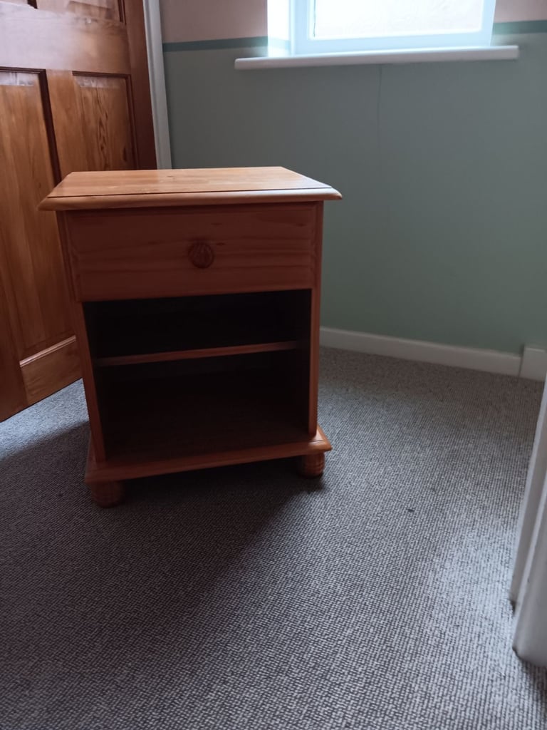 Matching bedroom furniture set in natural wood finish, includes: