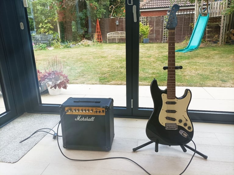 Electric guitar and amplifier