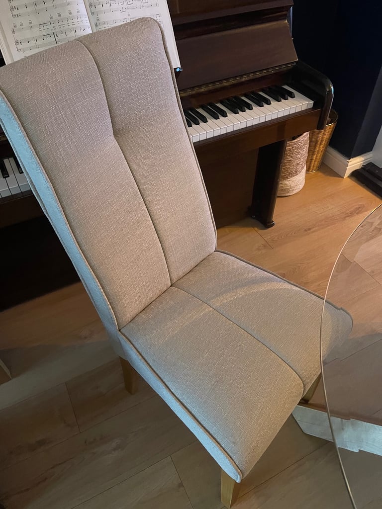 Oak and glass dining table and four chairs