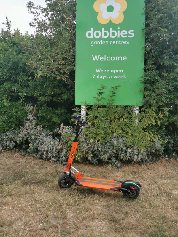 From USA an Orange electric scooter EMOVE Cruiser 'S' 52V 1600W Dual