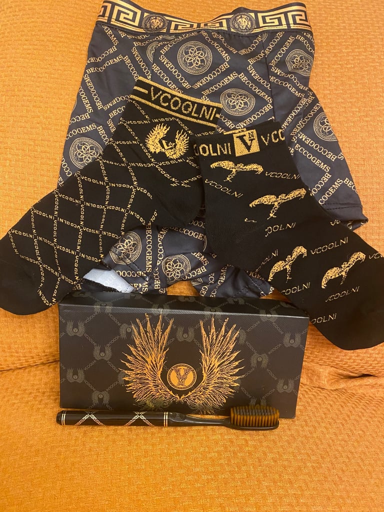 image for Black and gold men’s accessories 