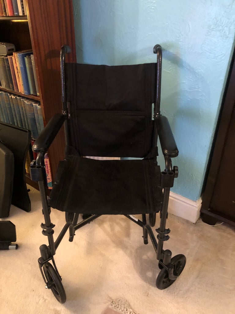 image for CareCo Rapid Folding Aluminium Wheelchair With tray and seat pad  
