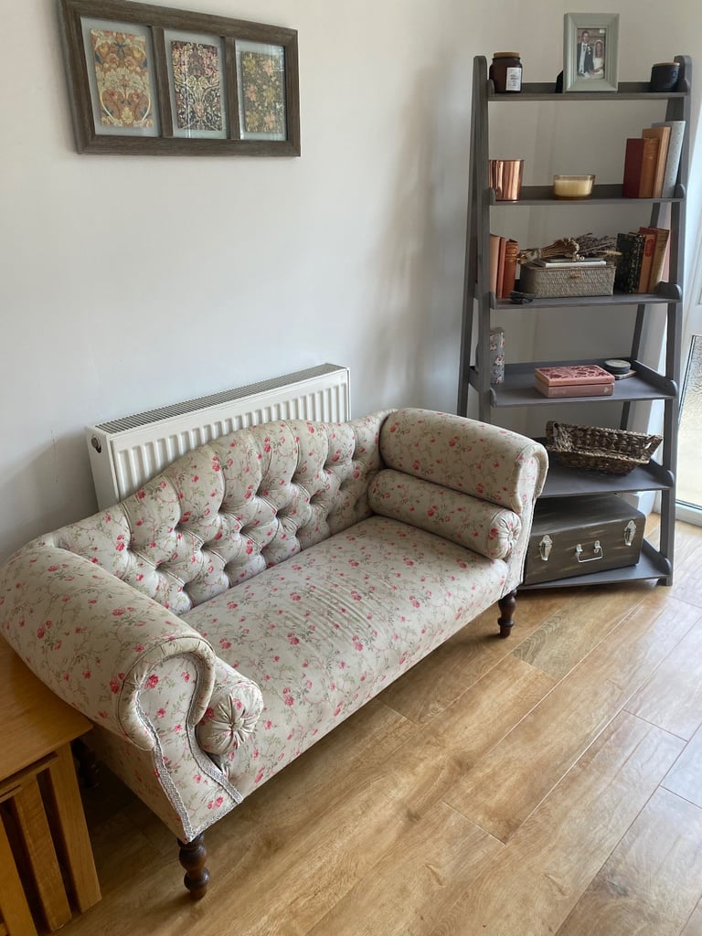 Ornate vintage small sofa