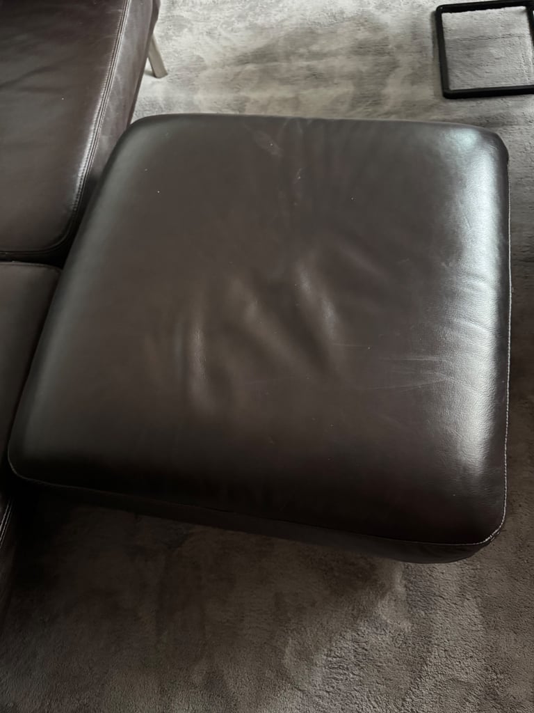 2 Seater leather sofa and puffer table 