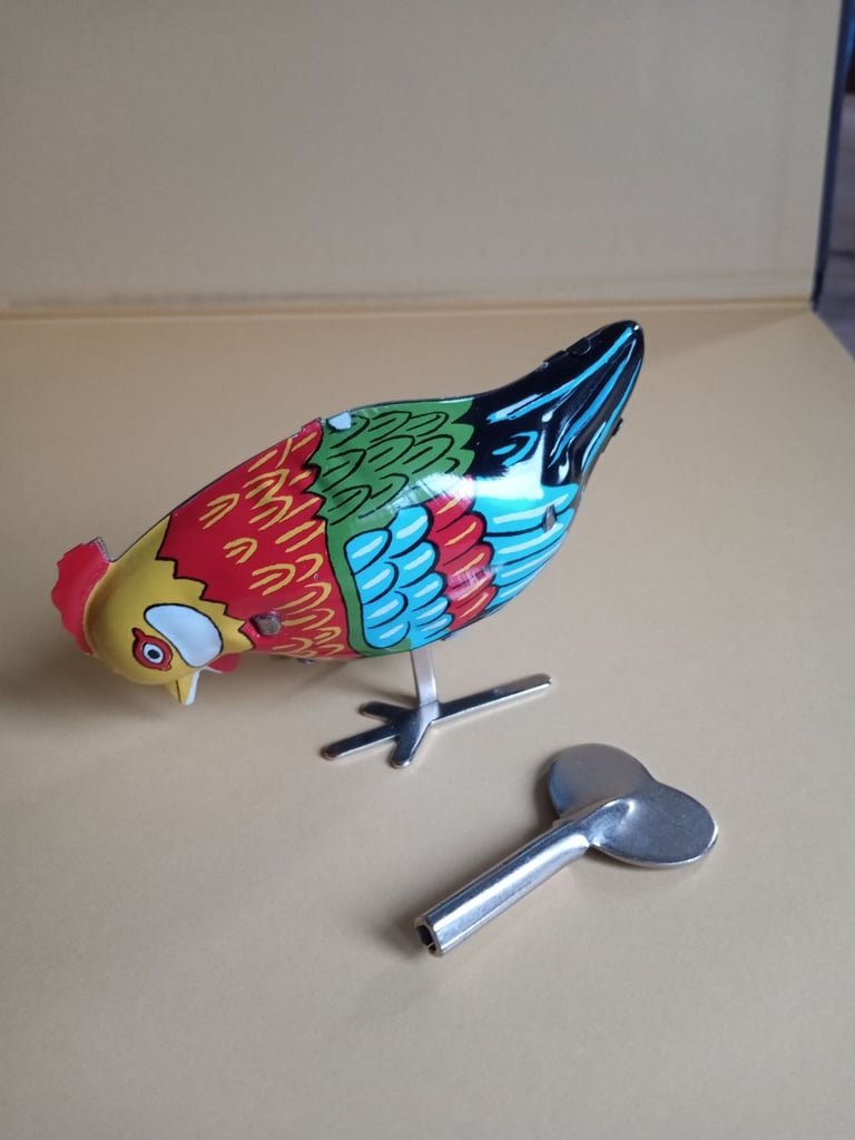 image for Tin pecking hen 