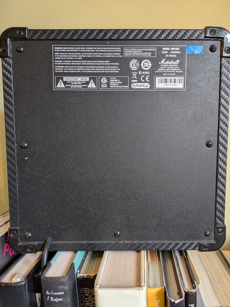 Electric guitar Cort Z44 and Marshall MG10CF amplifier - both barely used