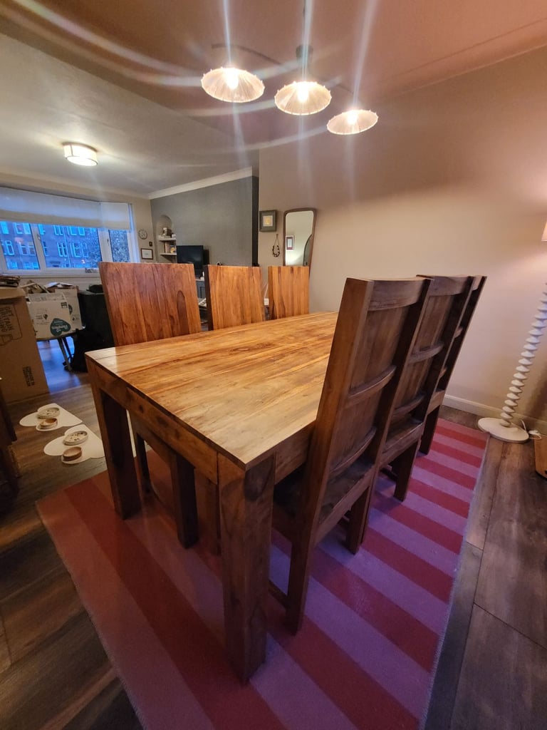 image for Solid wooden table and six chairs