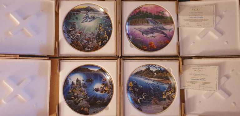 Collection of 4 Danbury Mint Underwater Paradise plates - boxed with stands