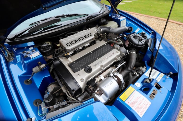 Lotus Elan M100 S2, 1995. Pacific Blue metallic with full dark blue leather.