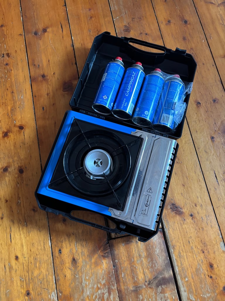 image for Camping stove and gas cartridges