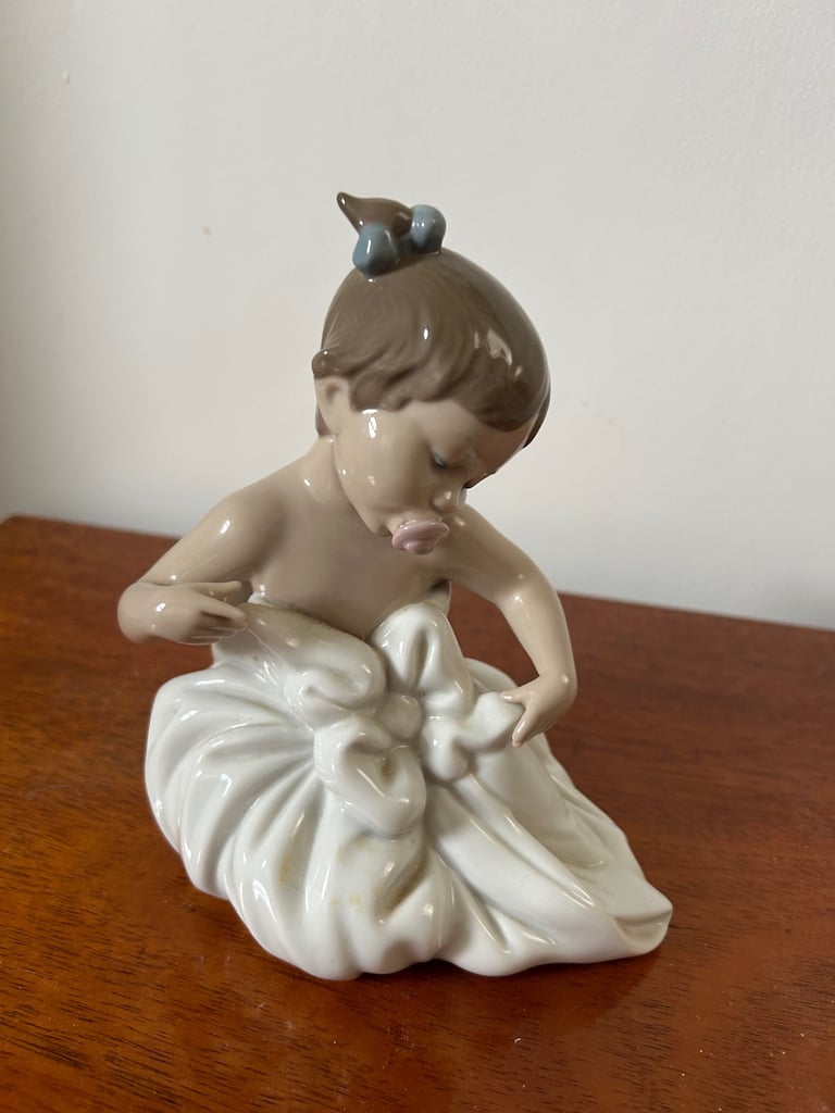 NAO by Lladro girl in blanket