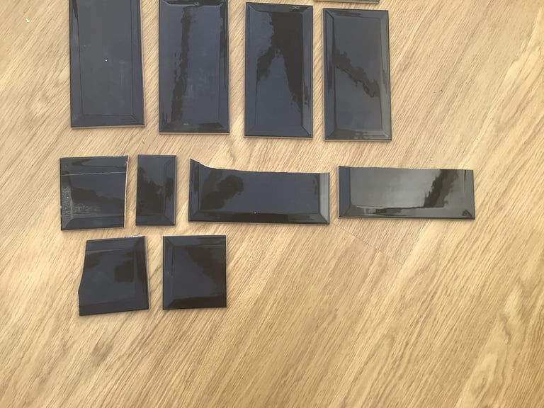 12 Black Wall Tiles  20 x 10 Cm  each tile Plus some cut Pieces  £ 3.00 for all 