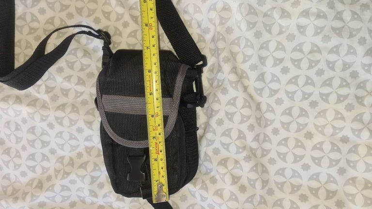 Camera bag/ case with shoulder strap. Multiple compartments. Excellent quality and condition.