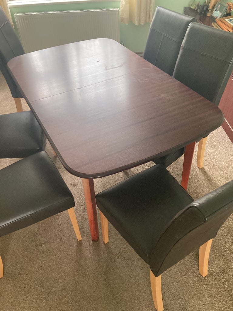 image for Table and 6 chairs 