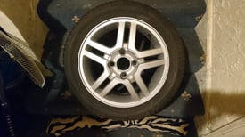 image for Set of four ford alloys size 15 with tyres 