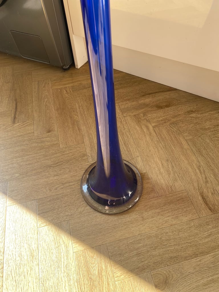 Blue glass tall vase. 