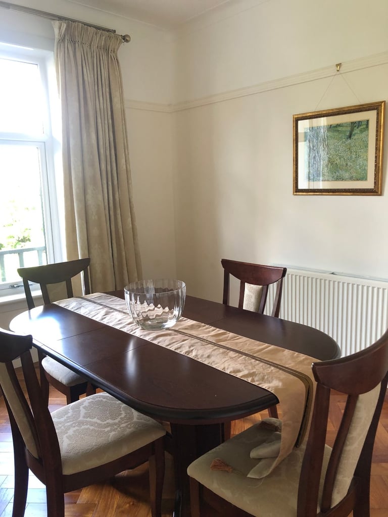 WOODEN OVAL DINING TABLE AND 4 CHAIRS