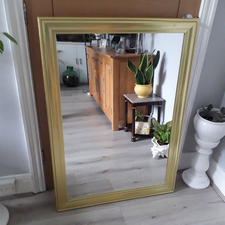 GOLD FRAMED MIRROR, COULD DELIVER.