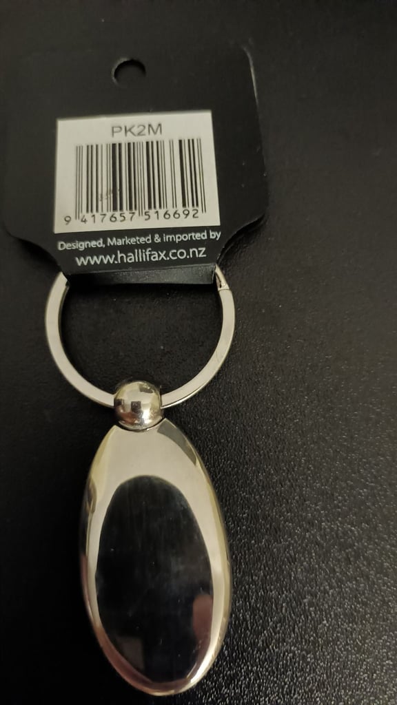 New Zealand Paua Shell Keyring with letter 'M'