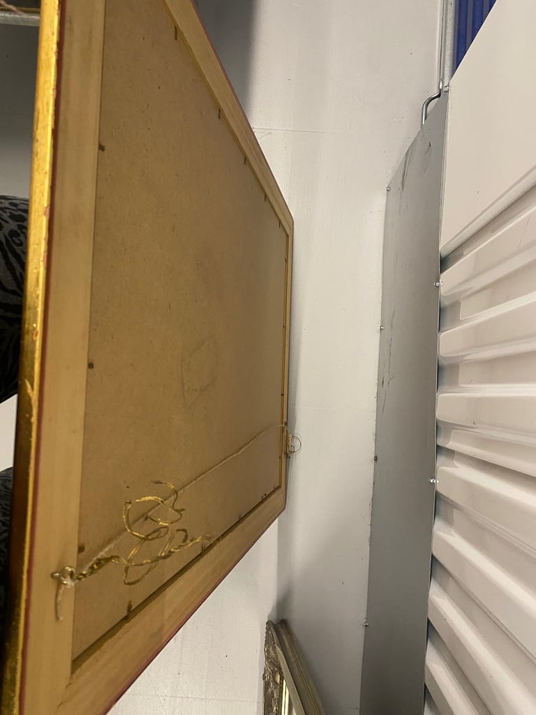 Mirror with gold frame 
