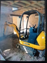 Mini digger hire with operator 