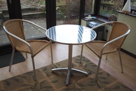 Circular Table and Two Chairs