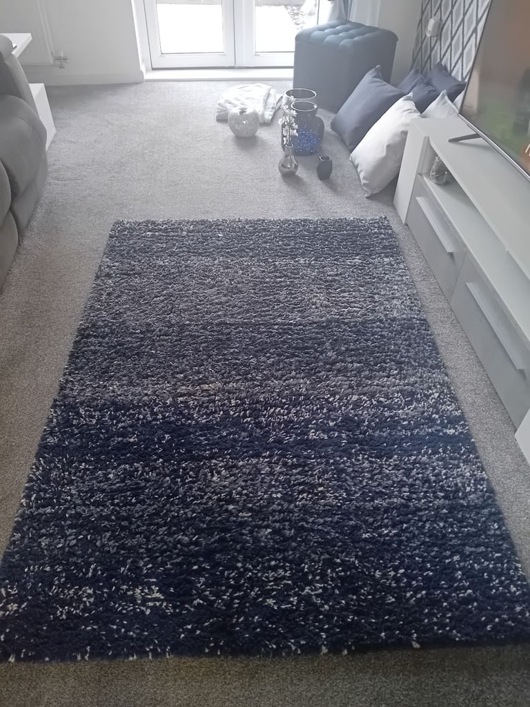 Lots of blue and grey/silver living room decor