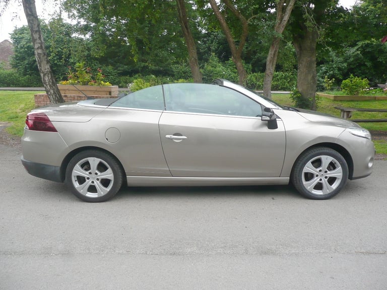 2012, 1.9 diesel Renault Megane convertible.