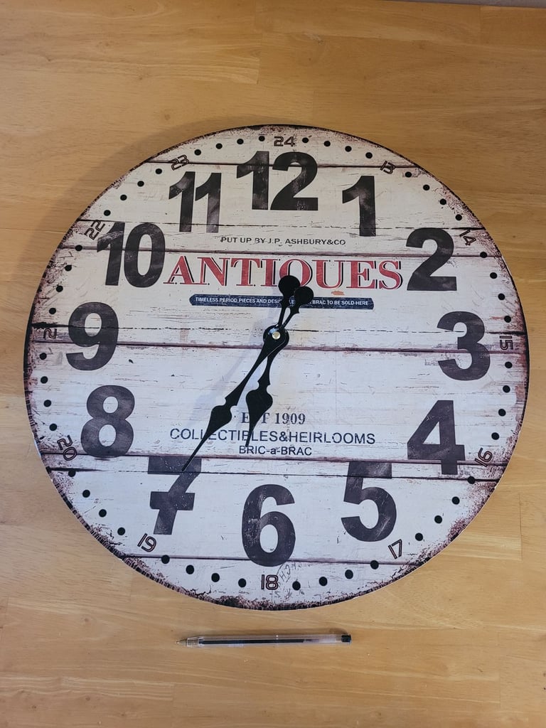 image for Large 'ANTIQUES' wood effect wall clock. Good condition.
