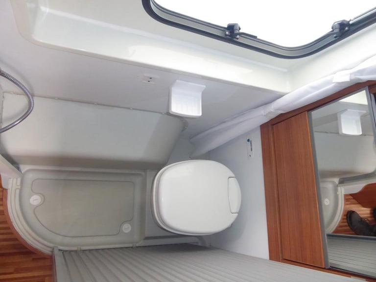 Adria Twin SF. 2013. Rear French Bed. Half dinette hosts 5.