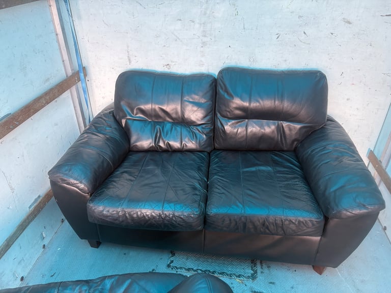 2 x blue 2 seater leather sofas . Free to collect 