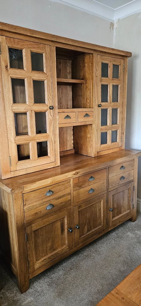Oak dining table with six chairs and oak dresser