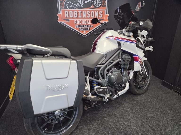 2013 Triumph Tiger Explorer 1215 in white with luggage.