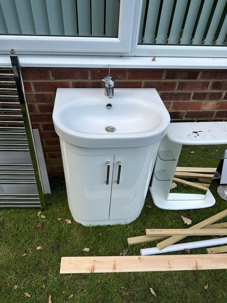 BATHROOM SUITE OF THREE ITEMS: VANITY SINK UNIT, MIRROR WALL CABINET, HEATED TOWEL RAIL