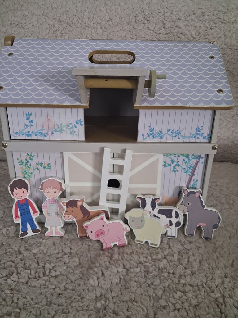 Wooden play house wirh animals 