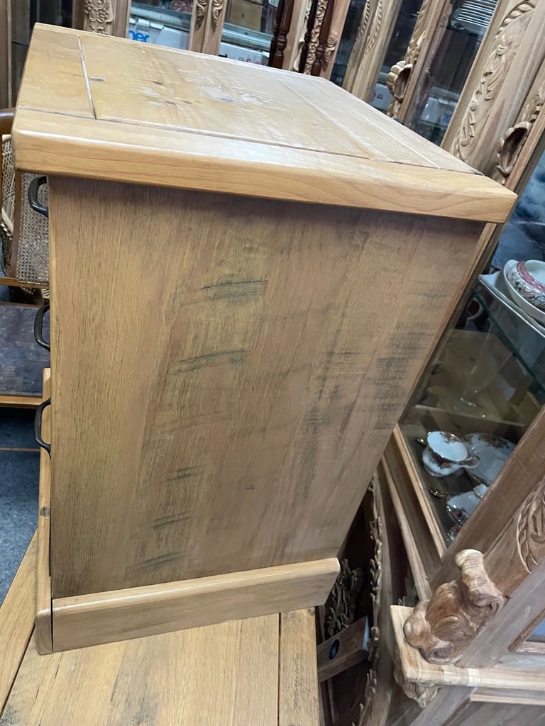 Two, solid wood bedside cabinets.