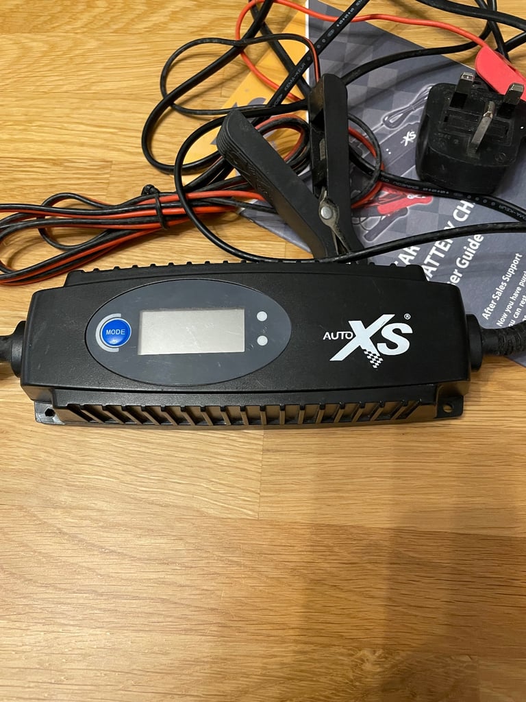 Auto xs smart car and motorcycle battery charger. Good working order 
