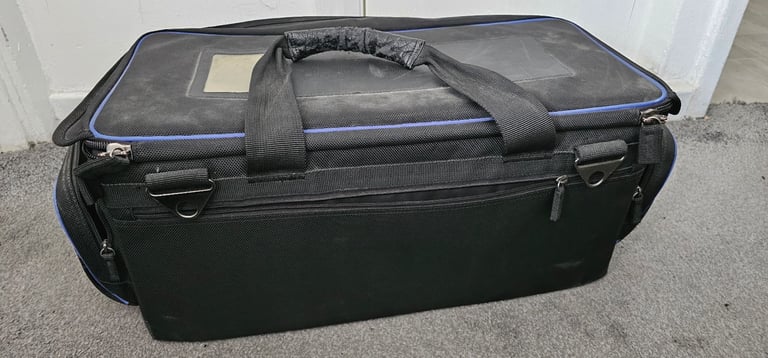 Sony camcorder bag with strap.