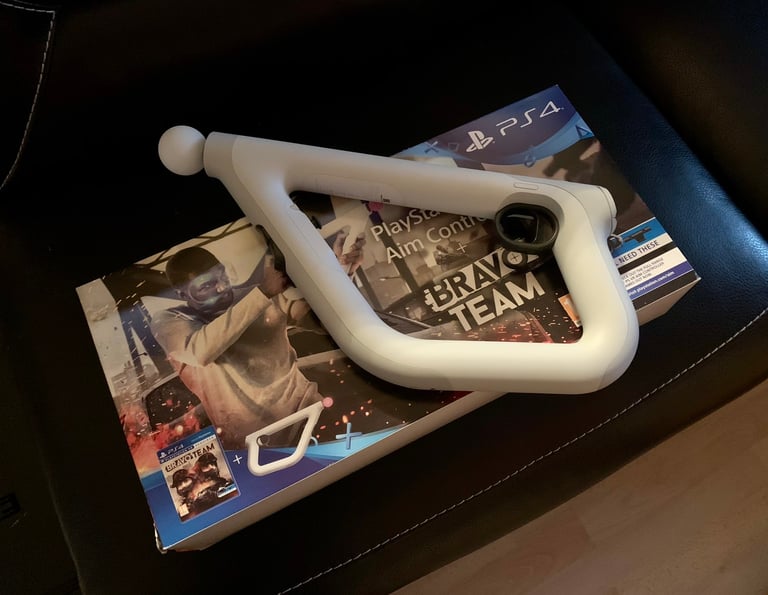 PS4 VR Aim Controller Gun Bravo Team Pack + 4 More Games