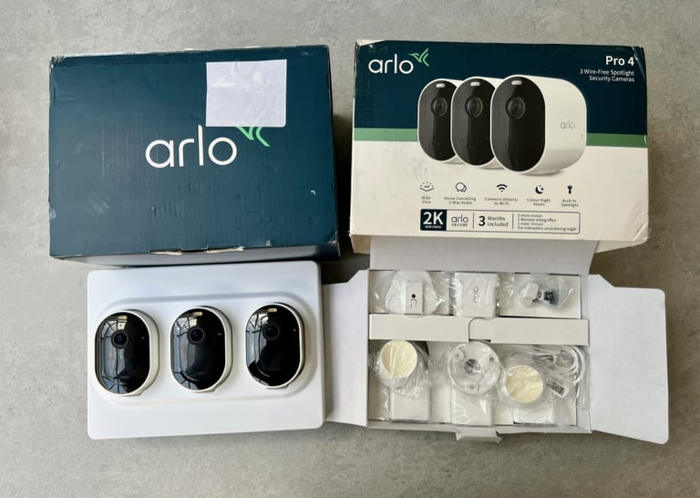 Arlo Pro 4 Wireless WiFi CCTV Surveillance Smart Security System 2K HDR Three Cameras in White.
