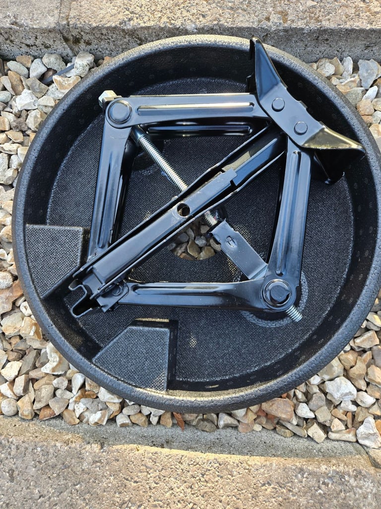 Spare wheel+ jack.
