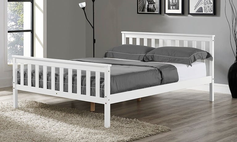 white wooden bed with mattress