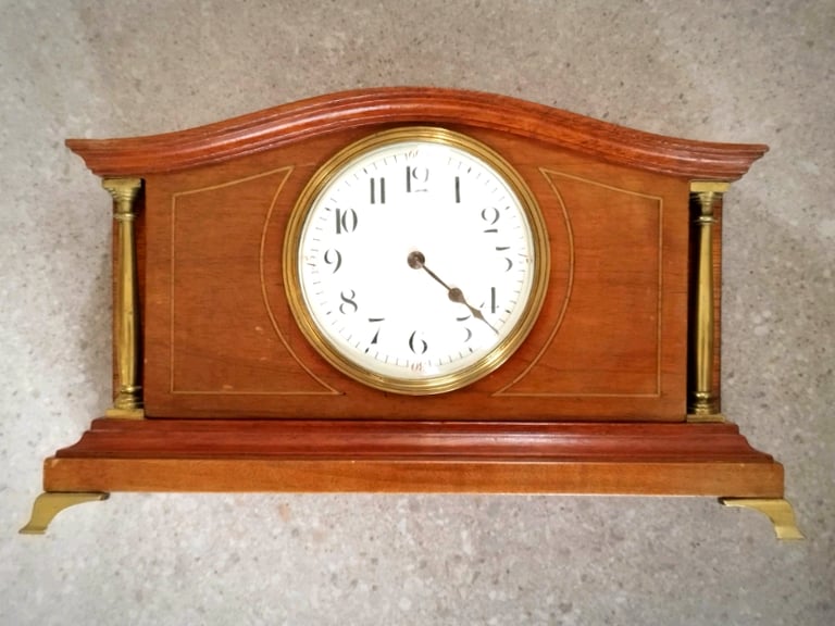 Edwardian mantle clock, circa 1910. Mahogany with solid brass action. 