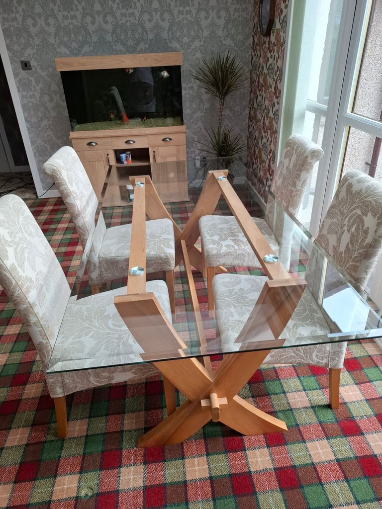 image for Dining table and chairs